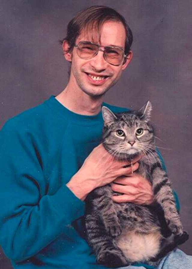 Men Posing With Their Cats 10