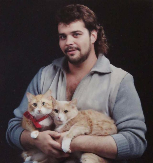 Men Posing With Their Cats 11